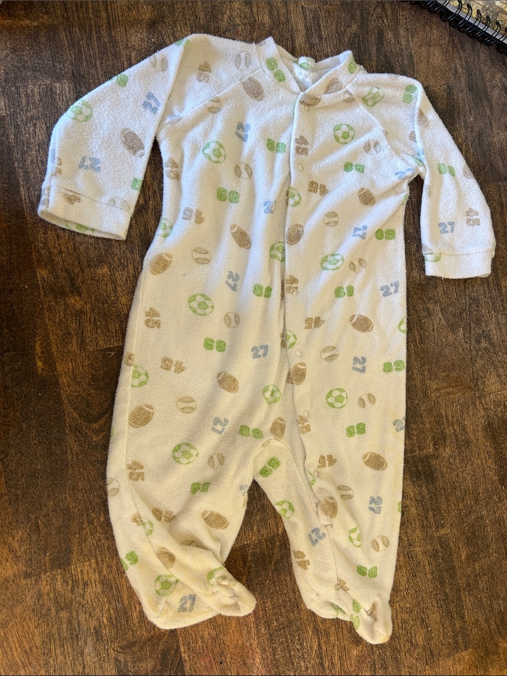 Cream Footed Baby One-Piece with Green & Blue Sports Motif